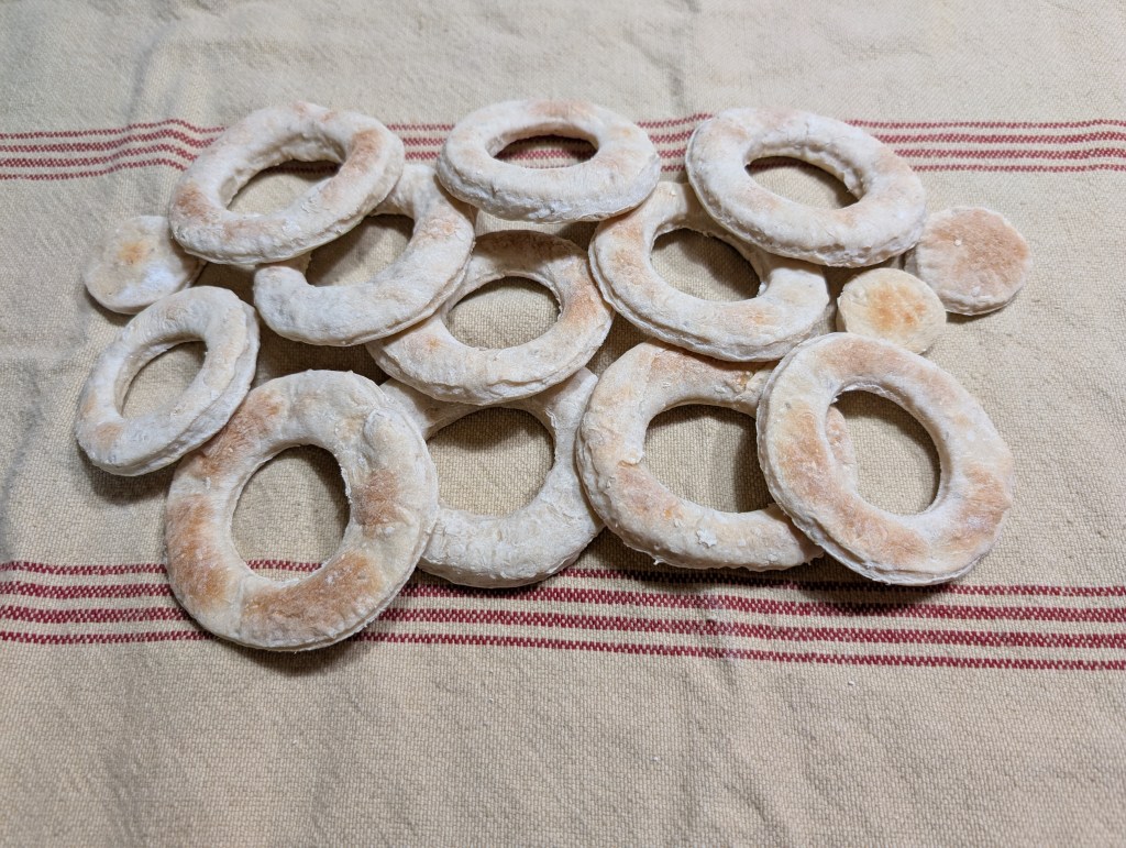 A batch of crisp breads on a tea towel