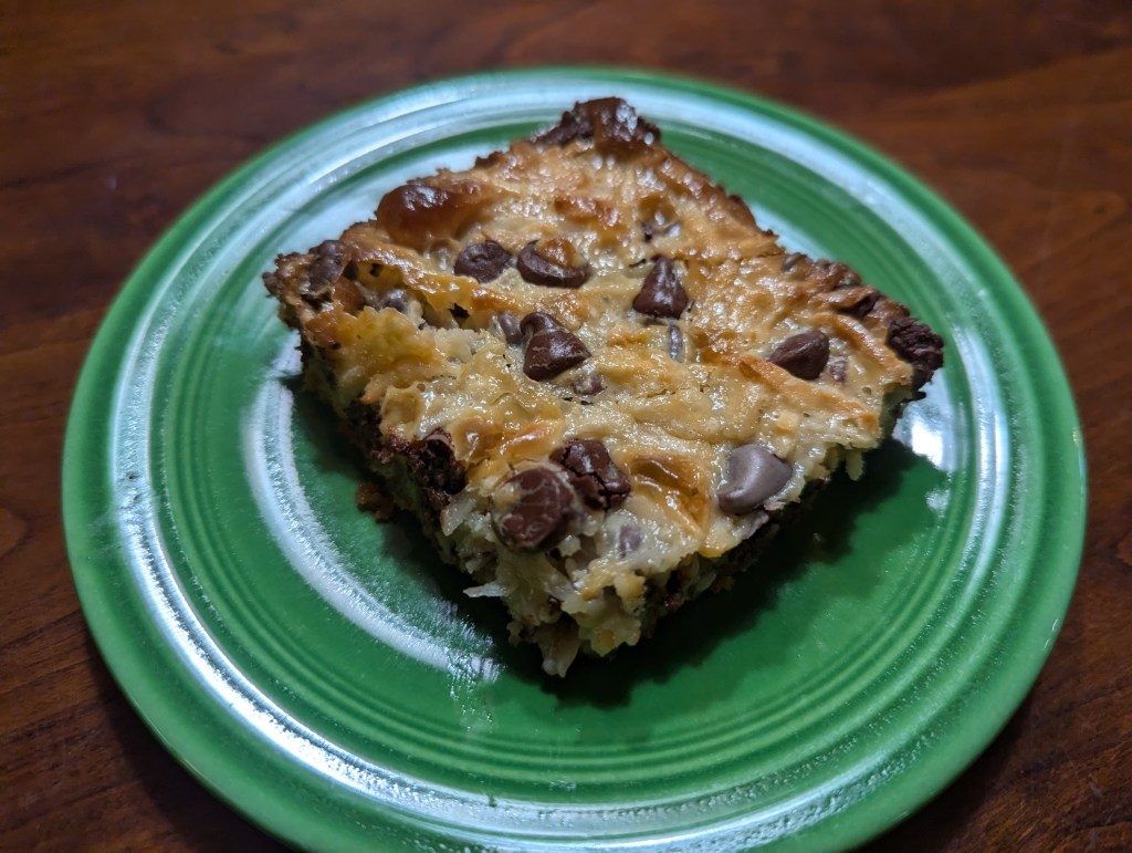 Magic cookie bar on a fiesta plate