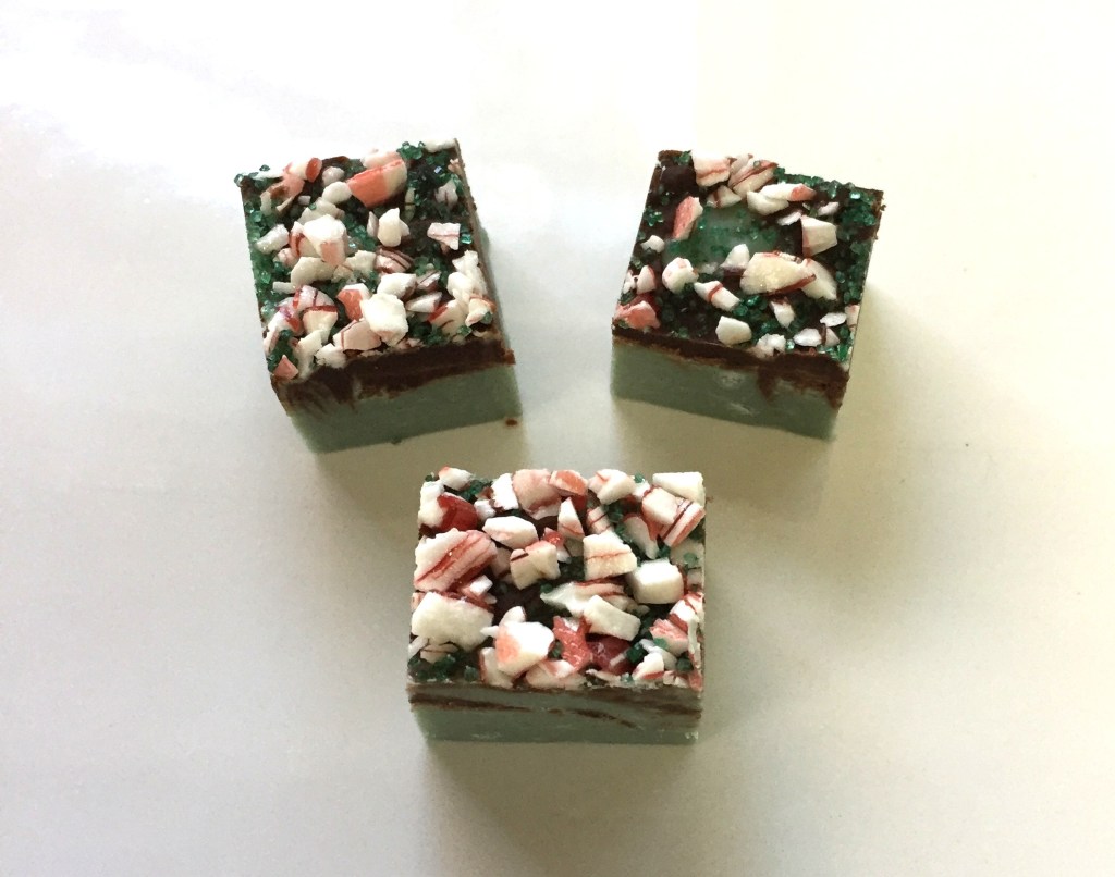 Close up of three pieces of mint chocolate fudge