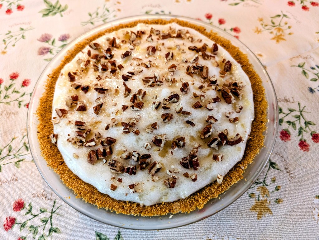 Angel food pie without whipped cream, with chopped pecans, and a graham cracker crust