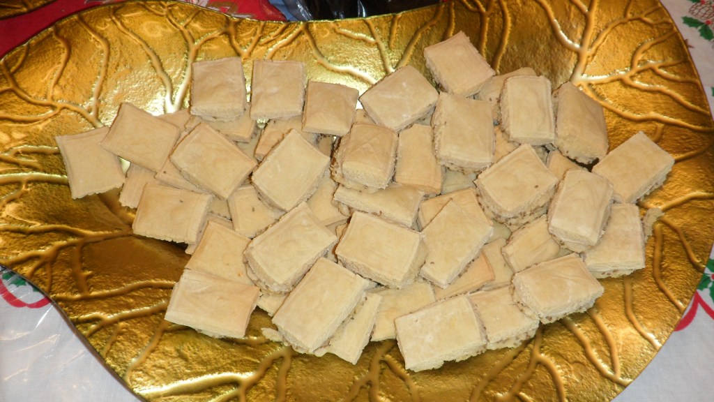 Springerle cookies in a large leaf-shaped tray