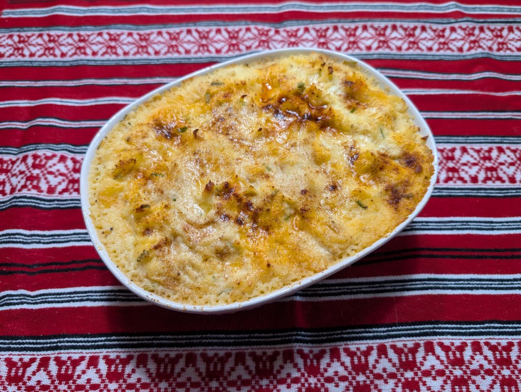 twice-baked potato casserole in a ceramic casserole dish