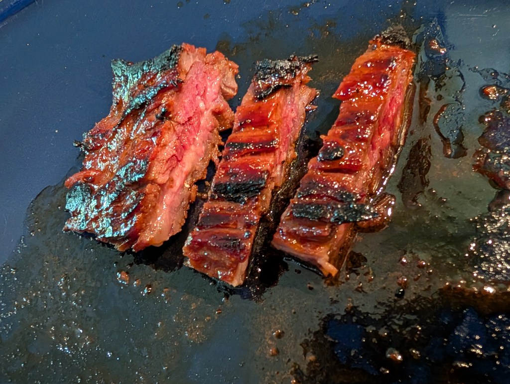 Skirt steak grilled with the Love Me Tender marinade. This is not a lot of meat, but it's all that was left when I realized I should take a photo and write down the recipe.