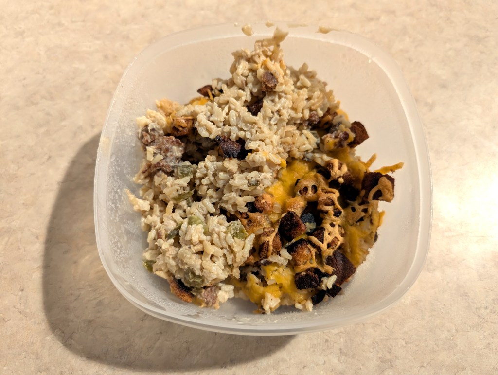 Rice tuna casserole in a leftover container after it's been in the fridge overnight