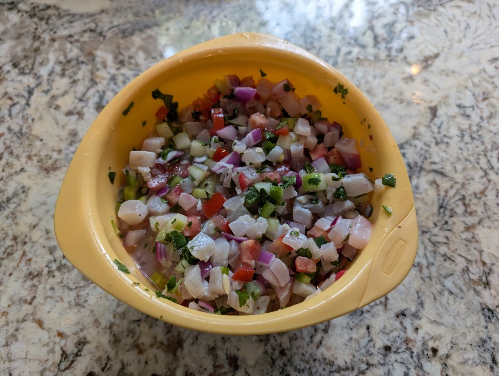 Ceviche in a mixing bowl, still "cooking"