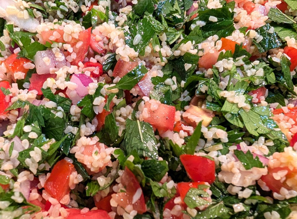 close-up of tabouleh in the mixing bowl