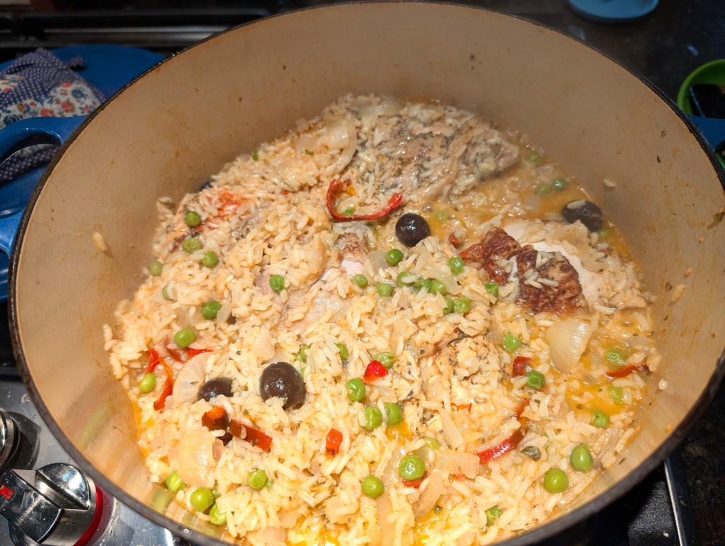 Arroz con pollo. close to done in a Dutch oven