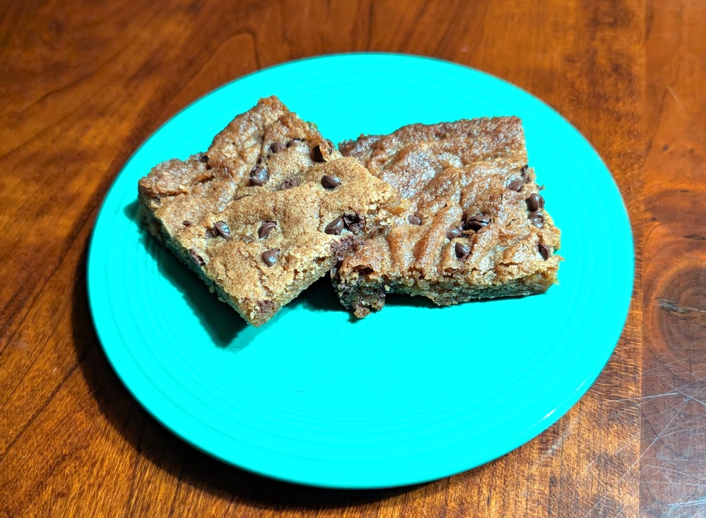 2 blondie squares on a neon green plate, because '80s