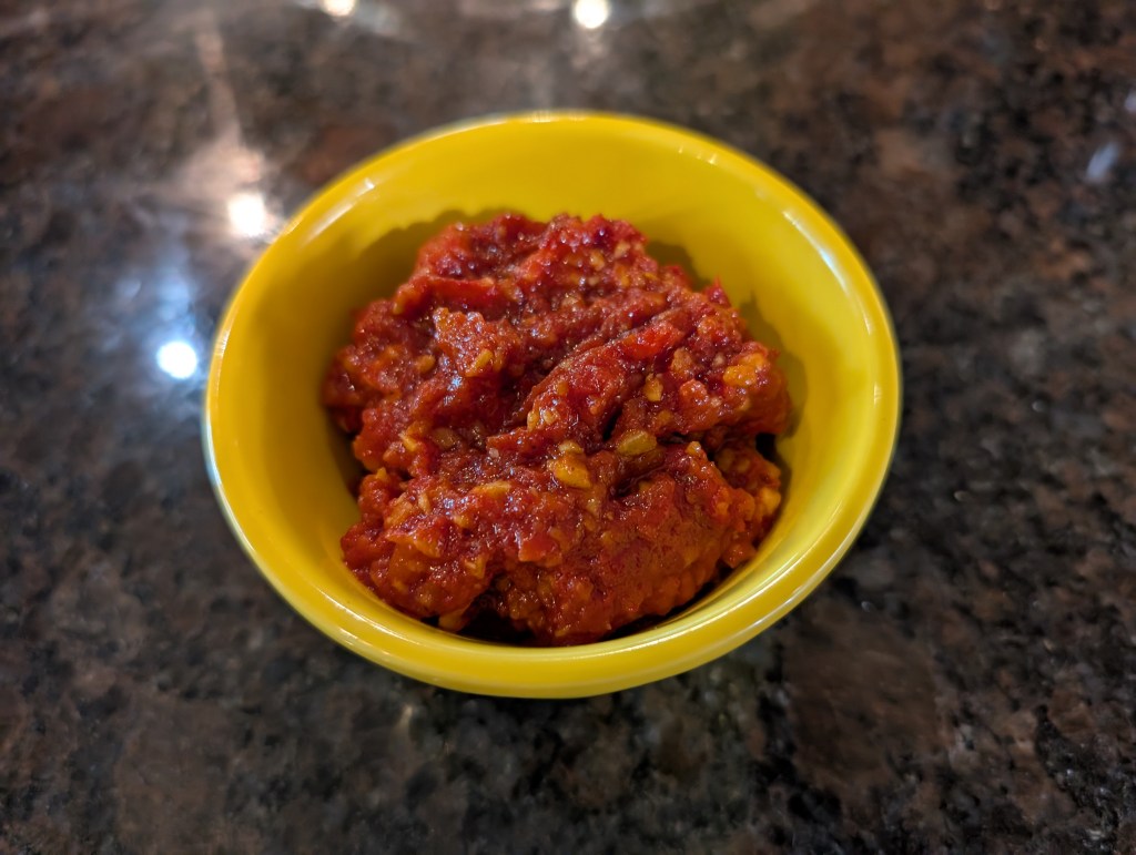 Tomato garlic chutney in a small bowl
