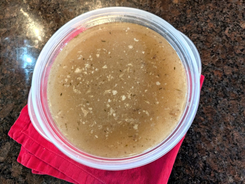 Broth in a plastic container