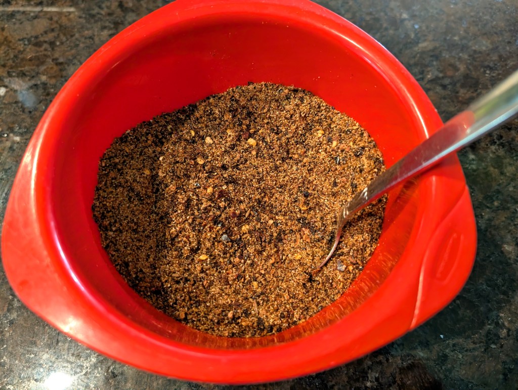 Mexican chili powder in a mixing bowl